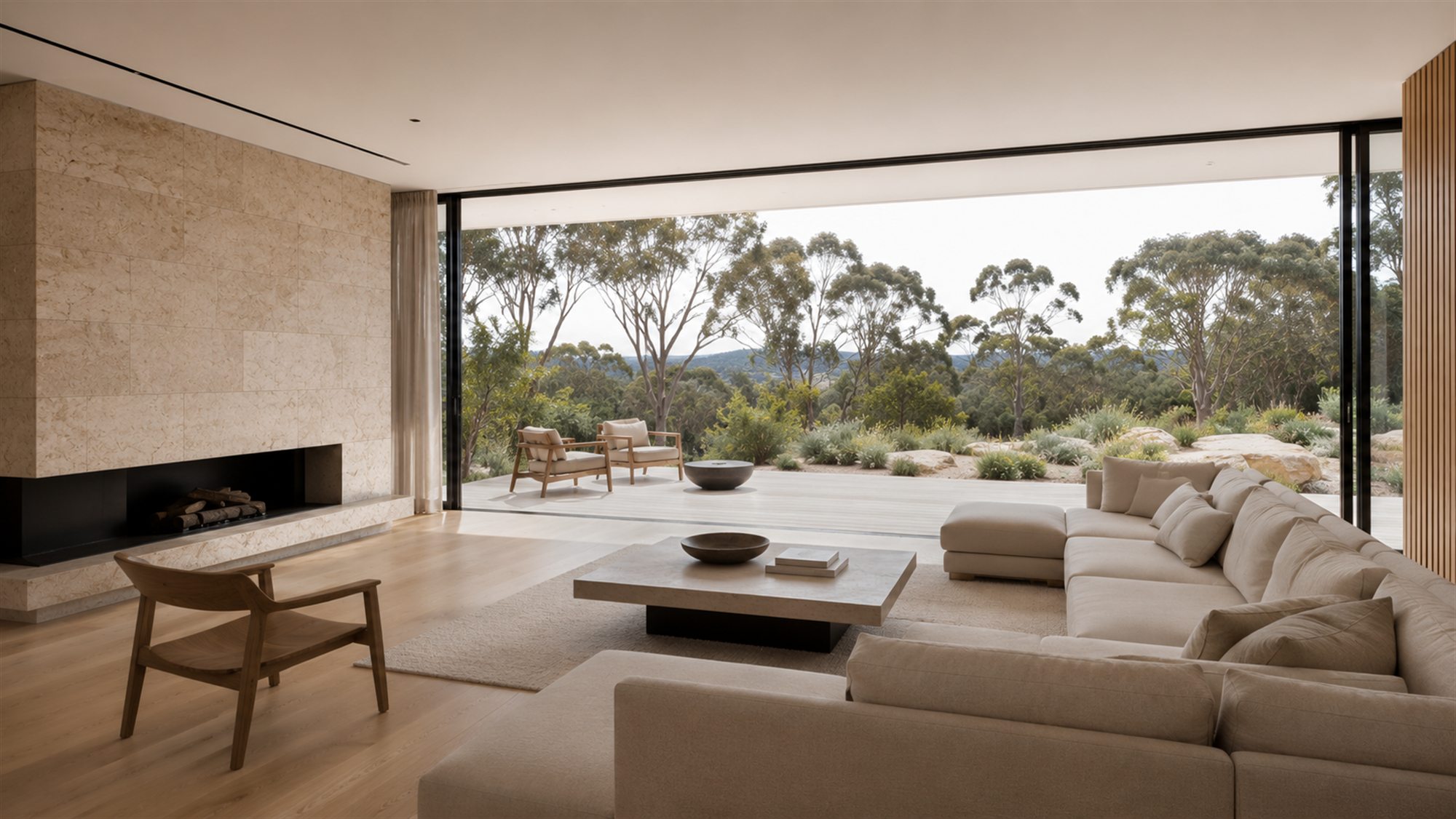 A calm, light-filled living space opening directly onto the landscape